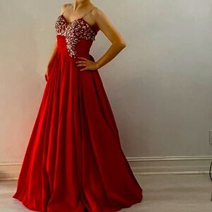 Red and brilliant couture evening gown